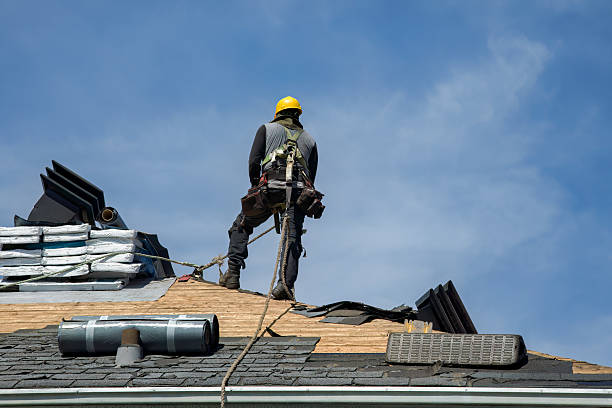 Professional Roof Replacement technician working in Moorefield, KY
